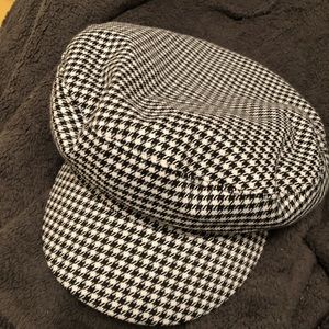 Houndstooth print train conductor hat